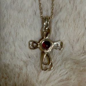 4layers of 18K gold necklace. Cross w/stone in center. Chain is around 16”